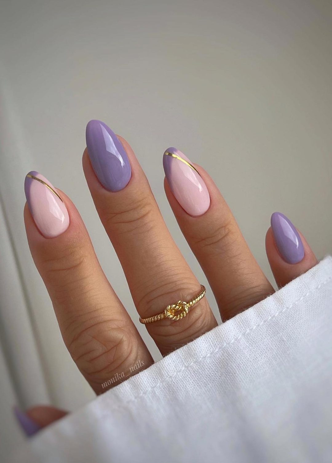 Light purple nails with French tips.