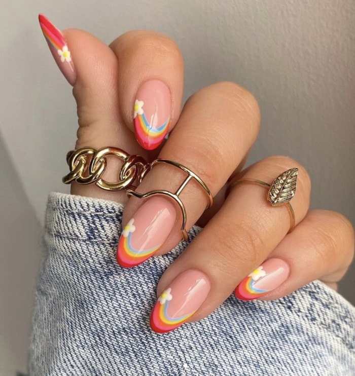 Rainbow French tip nails.