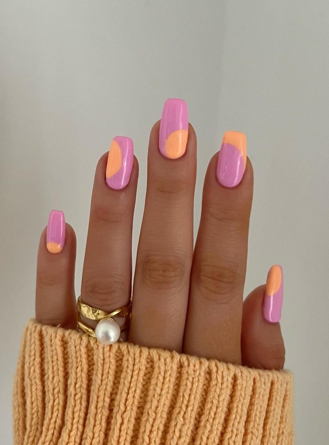 Pink and orange summer nails.