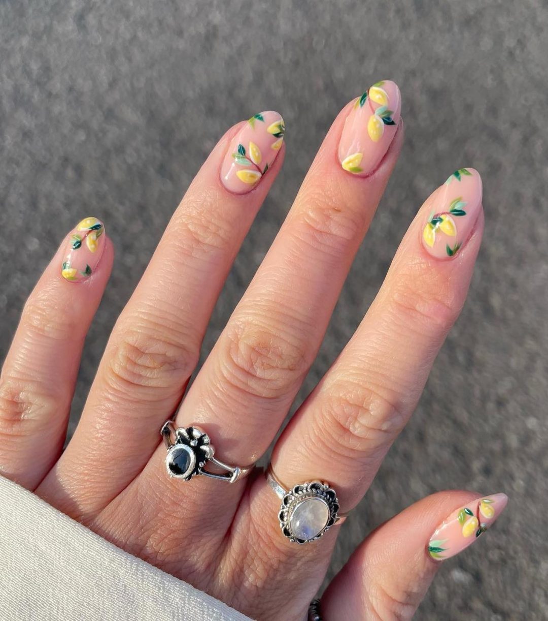 Natural clear nails with lemon print.