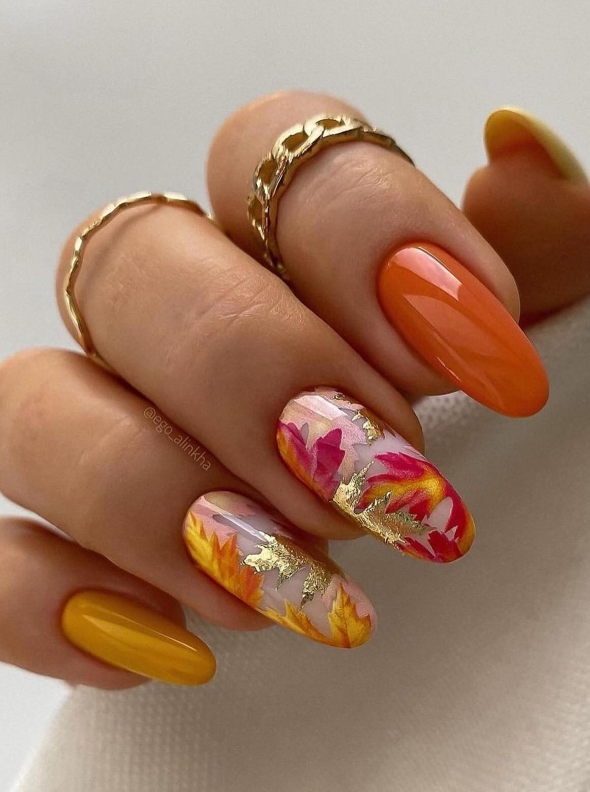 Mustard yellow and burnt orange Thanksgiving nails.