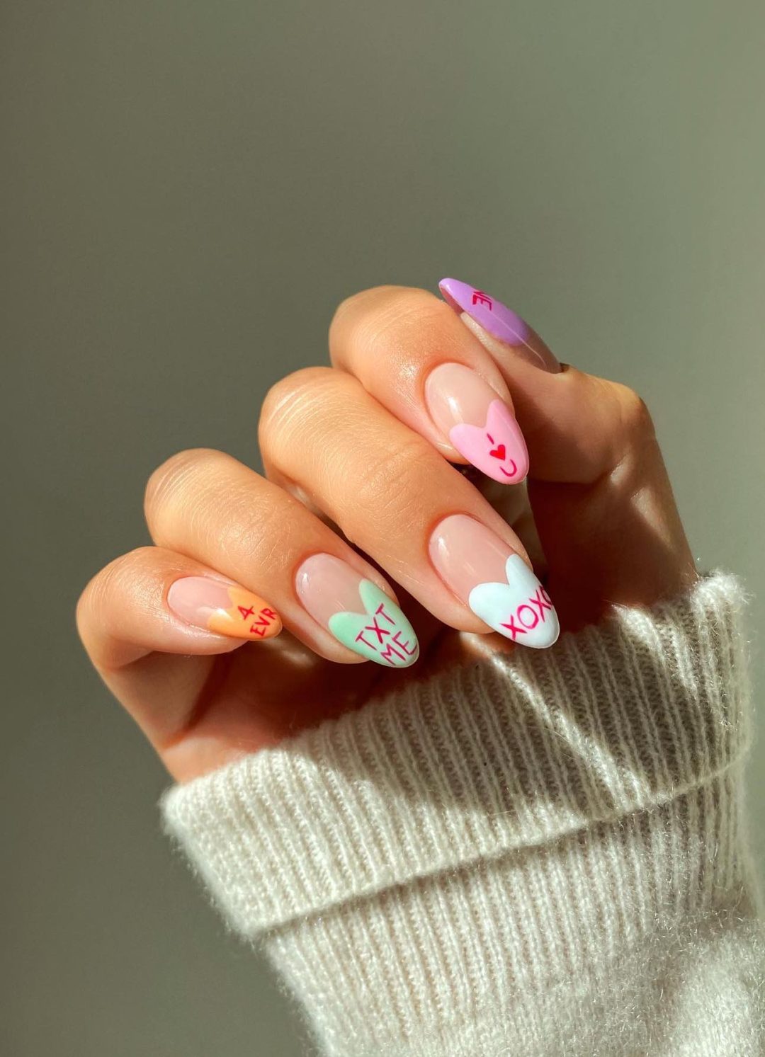 Cute love hearts nails.