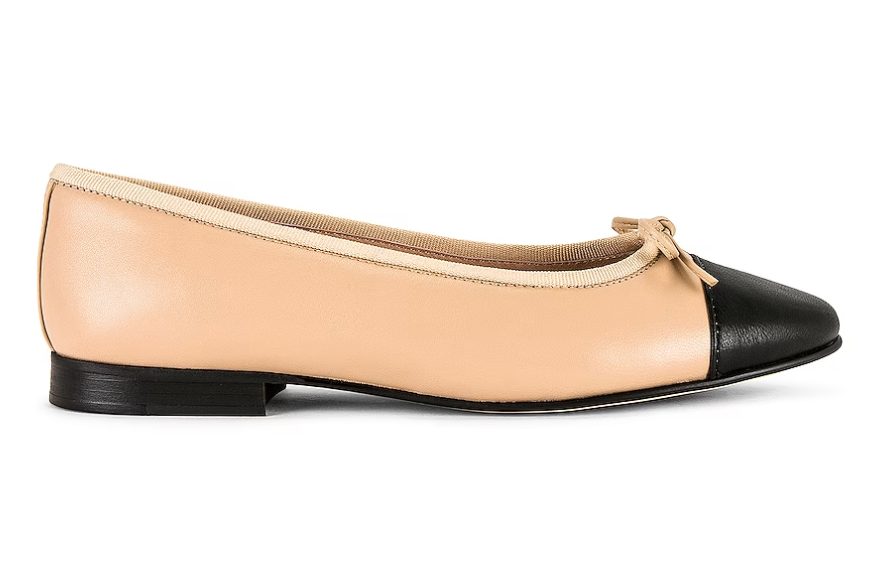 Beige ballet flats with black toe cap