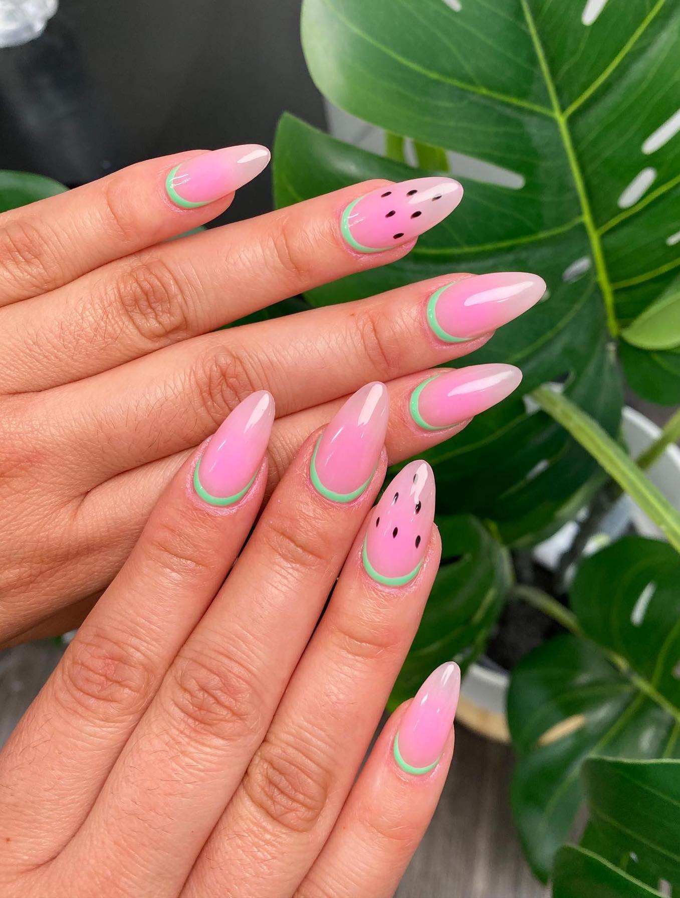 Pink watermelon nails.