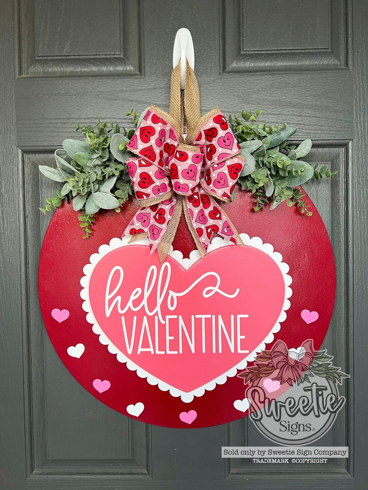 Red Hello Valentine door sign.