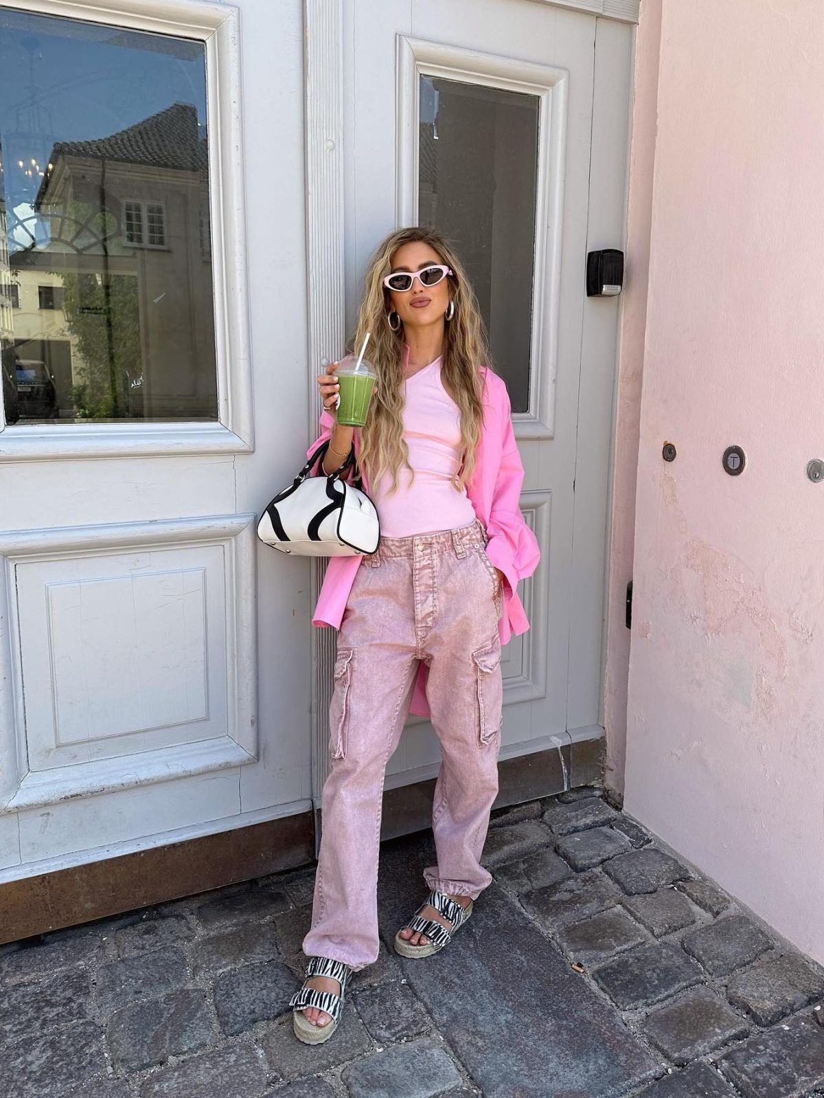 All pink outfit with cargo pants. 