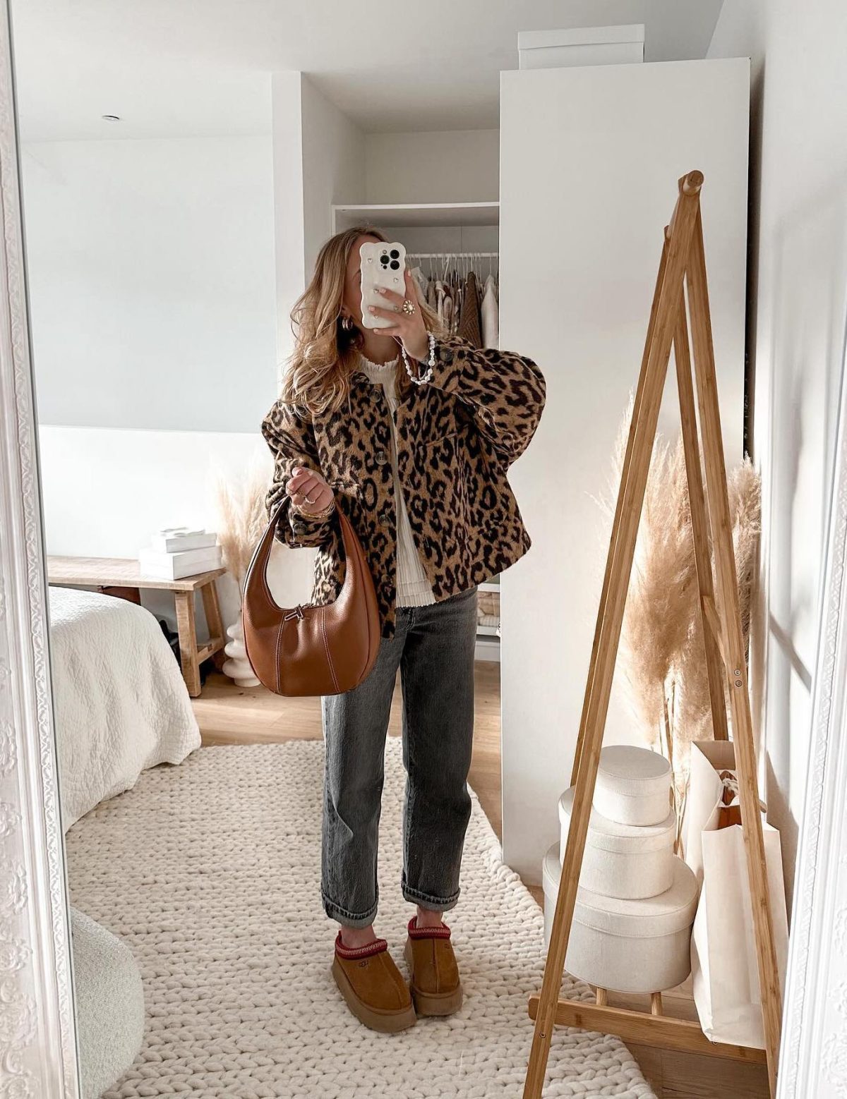 Casual spring outfit with a leopard print jacket grey jeans and Ugg Tasman slippers