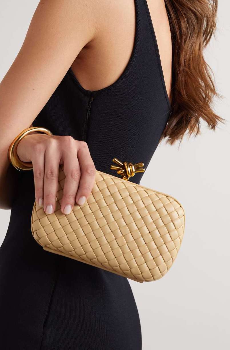 Beige Bottega Veneta Knot clutch.