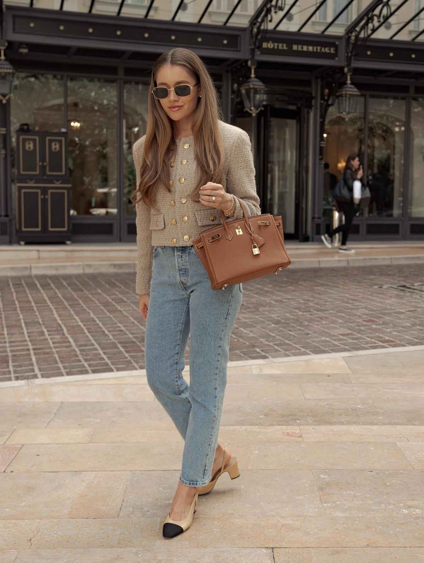 Chic fall outfit with jeans a Celine cardigan and Chanel slingback shoes