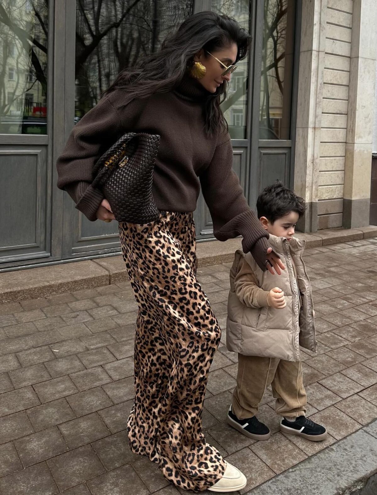 Leopard print pants with a brown sweater