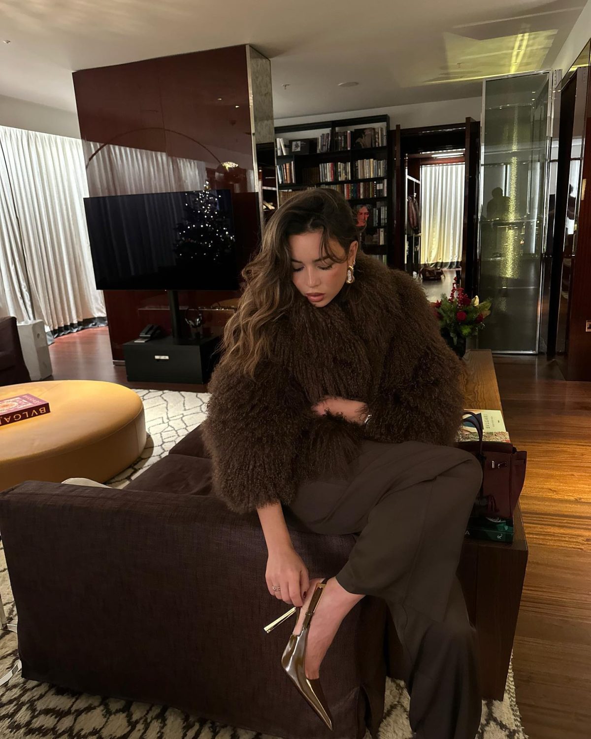 Brown outfit with a fuzzy jacket, pants and YSL Lee heels.